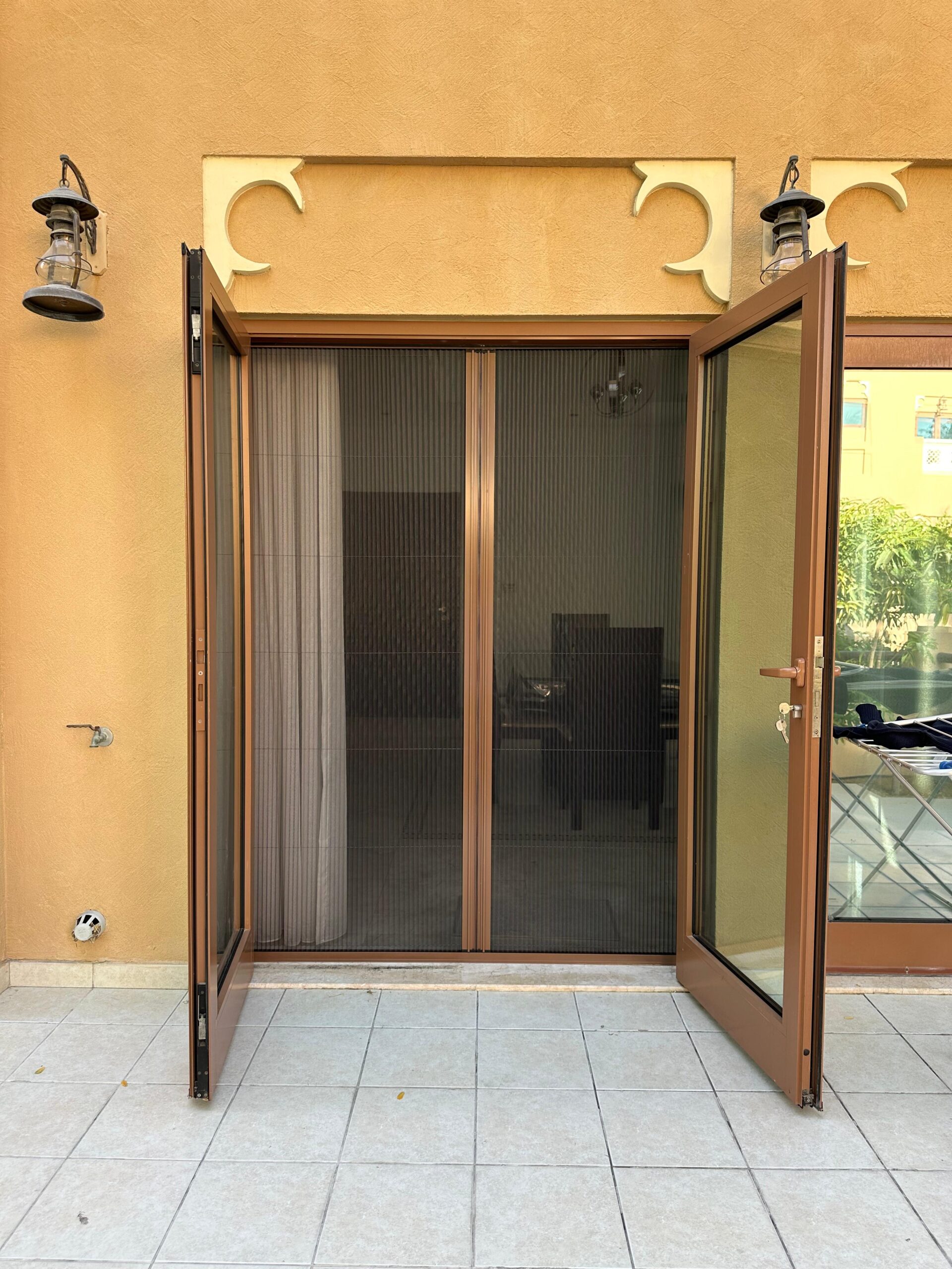 Single fly screen fitted to a front door in a Dubai home