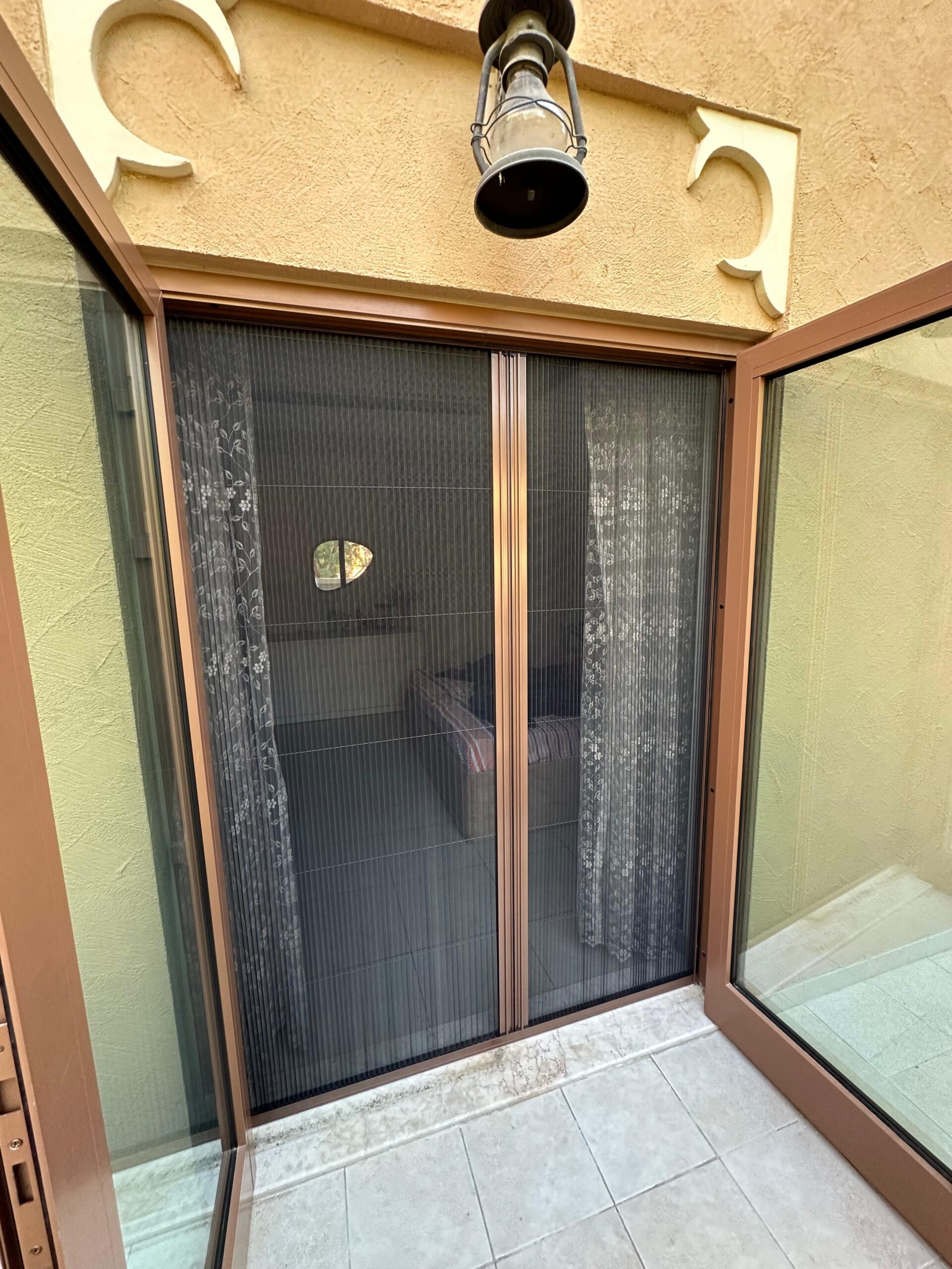 Insect screen fitted to a villa window in Dubai