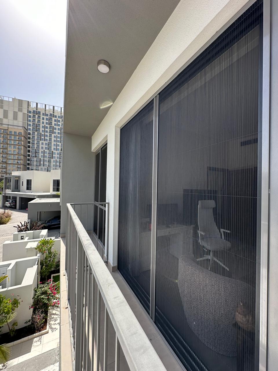 Single fly screen on a kitchen side door opening to the left in Dubai